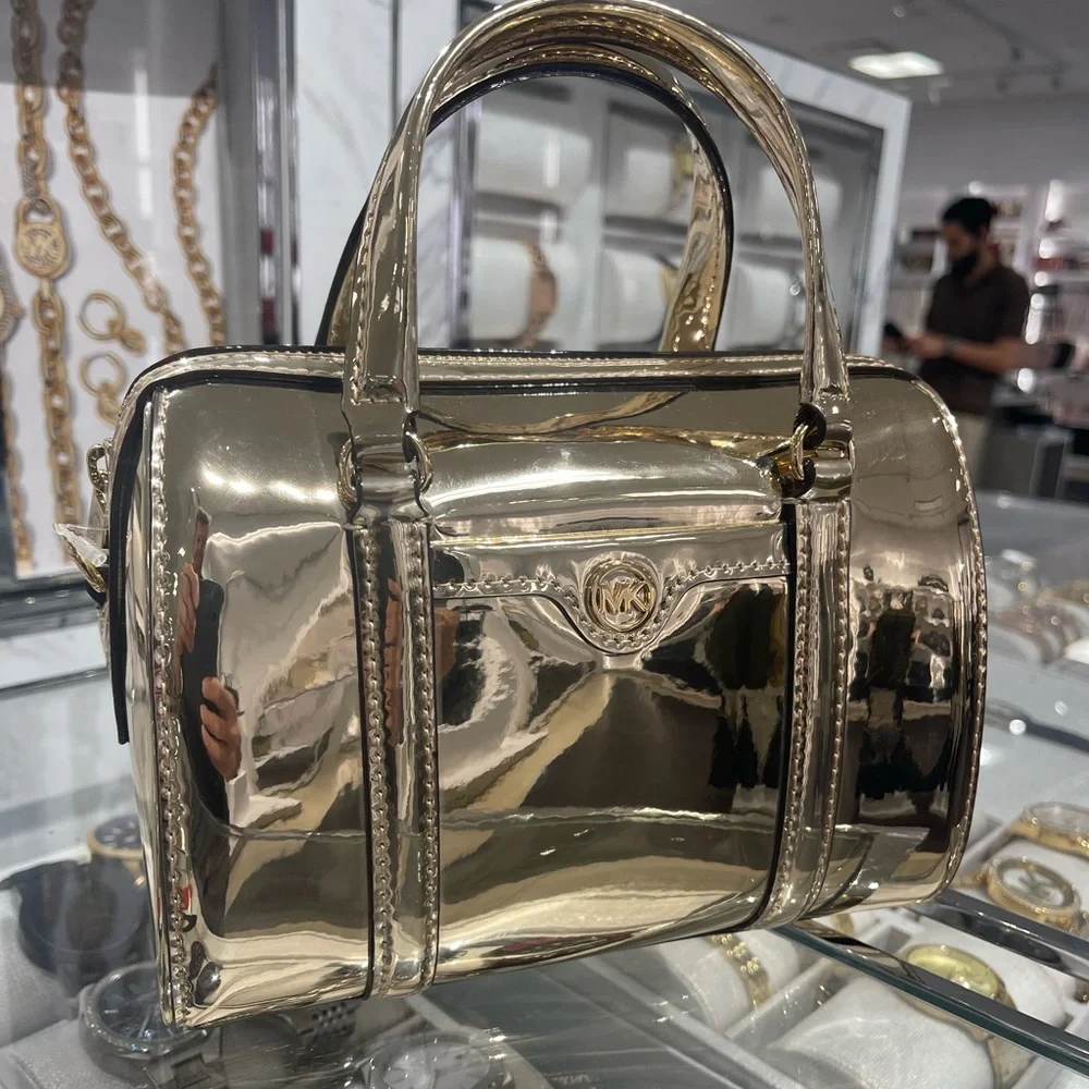 MICHAEL KORS Jet Set Small Metallic Convertible Crossbody Duffle Xbody
Pale Gold - Picture 15 of 16